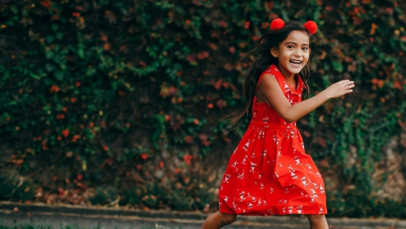 Girl running outside (HERO, Provincial and Territorial Policies)